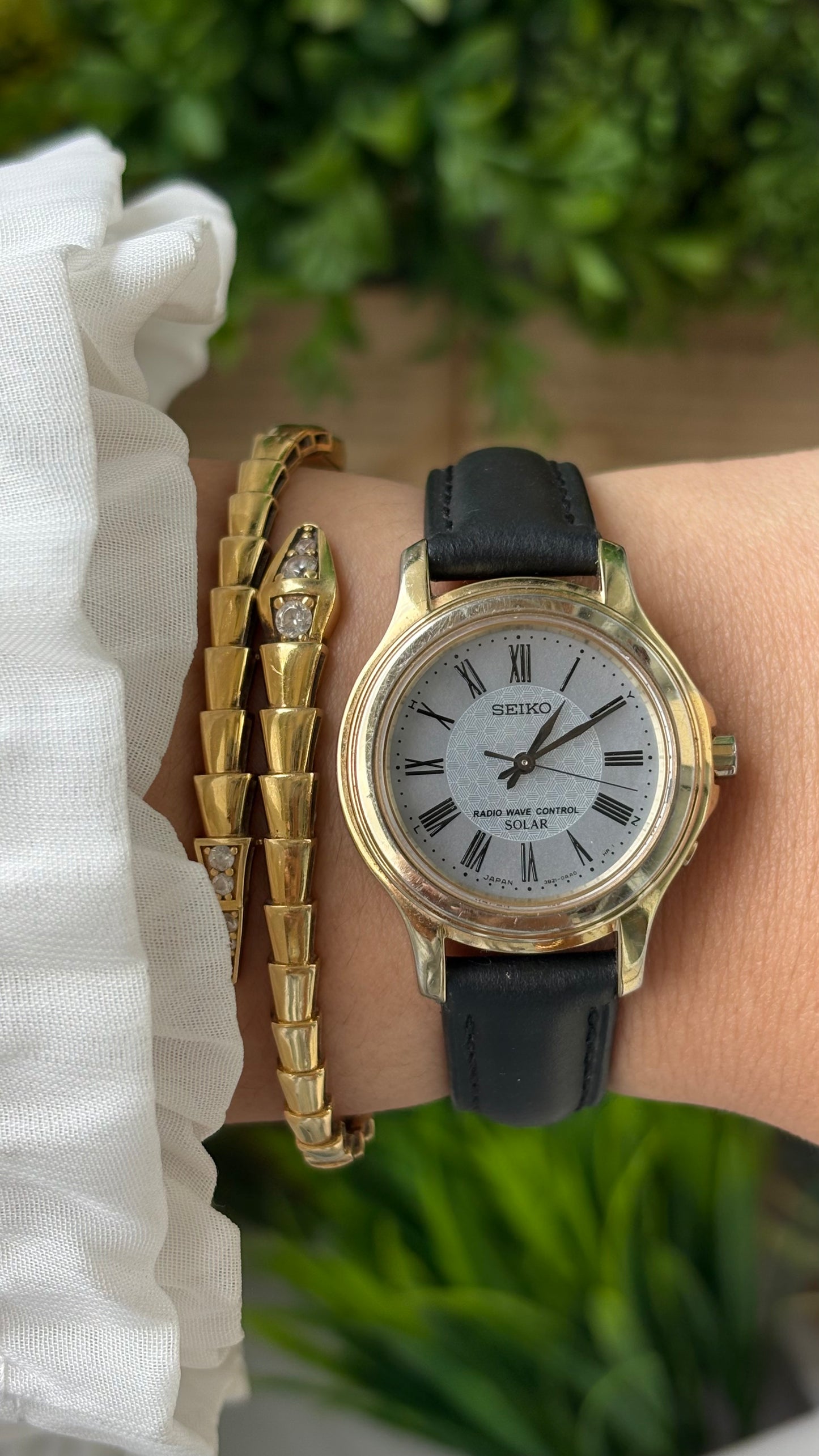 Extremely Rare Seiko Radio Wave Controlled Solar Power Watch in Gold Titanium Tone Black Leather Gray Mother of Pearl Dial Quartz #00601