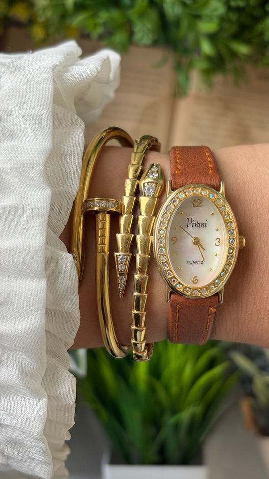 Vintage Vivani Elegant Rhinestone Bezel Watch in Gold Tone Brown Leather Mother of Pearl Dial Quartz #00930