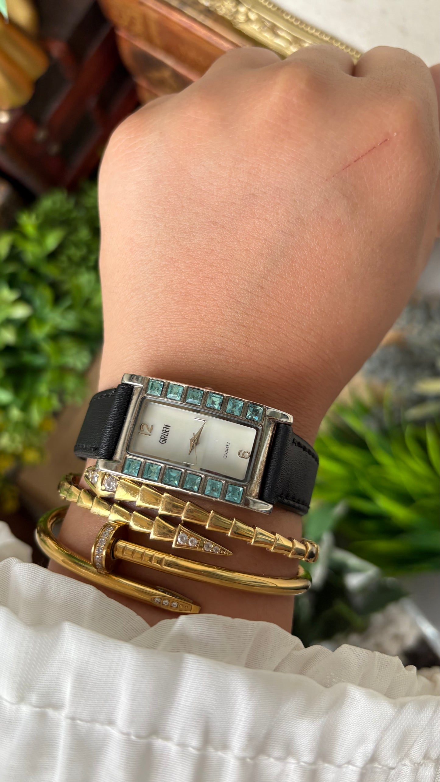 Vintage Gruen Side Rhinestone Accent on Bezel Tank Watch in Silver Tone Black Leather Mother of Pearl Dial Quartz #00941