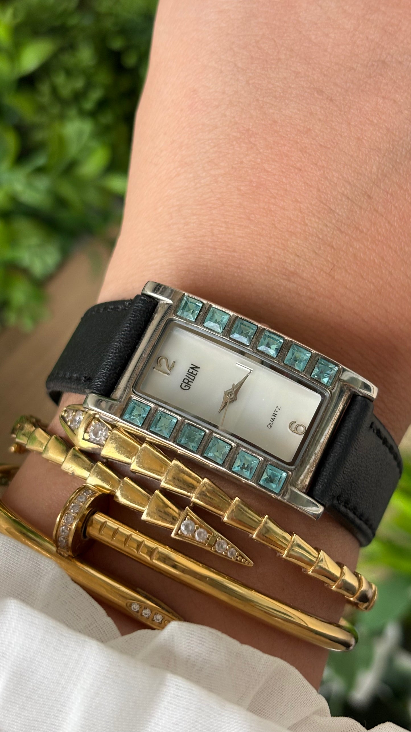 Vintage Gruen Side Rhinestone Accent on Bezel Tank Watch in Silver Tone Black Leather Mother of Pearl Dial Quartz #00941