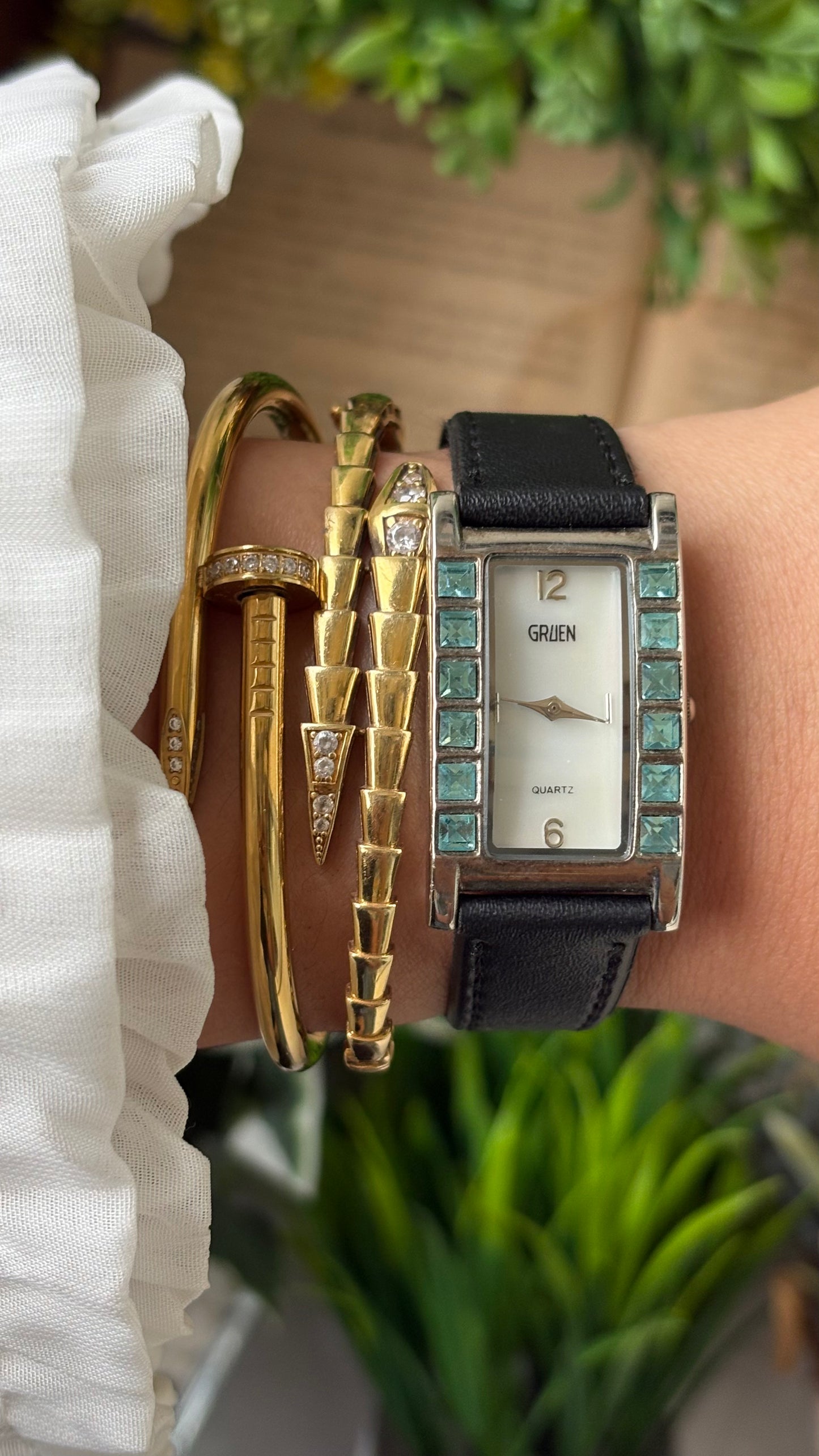 Vintage Gruen Side Rhinestone Accent on Bezel Tank Watch in Silver Tone Black Leather Mother of Pearl Dial Quartz #00941