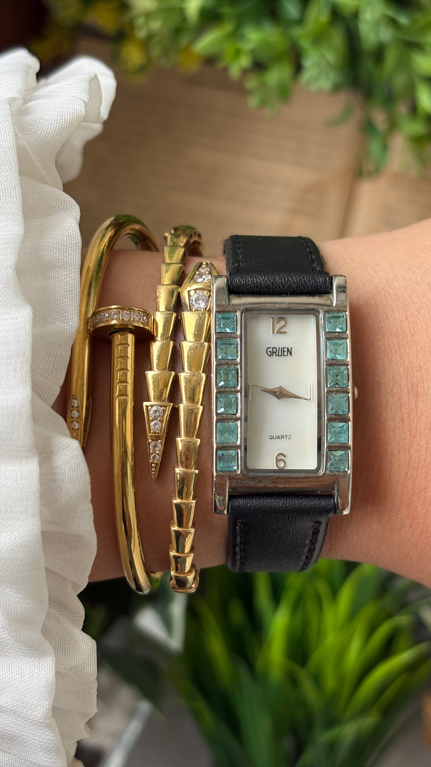 Vintage Gruen Side Rhinestone Accent on Bezel Tank Watch in Silver Tone Black Leather Mother of Pearl Dial Quartz #00941