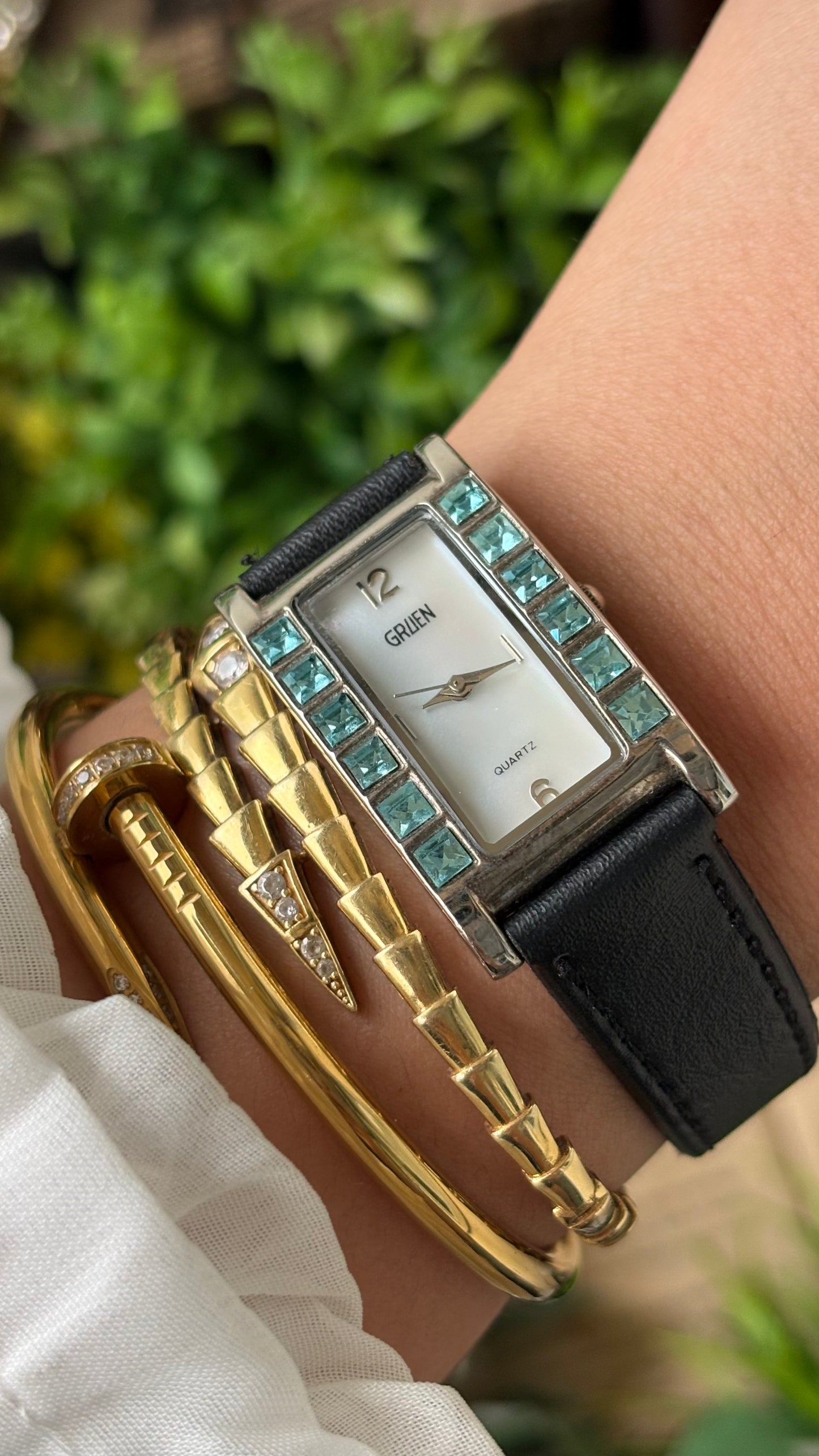 Vintage Gruen Side Rhinestone Accent on Bezel Tank Watch in Silver Tone Black Leather Mother of Pearl Dial Quartz #00941