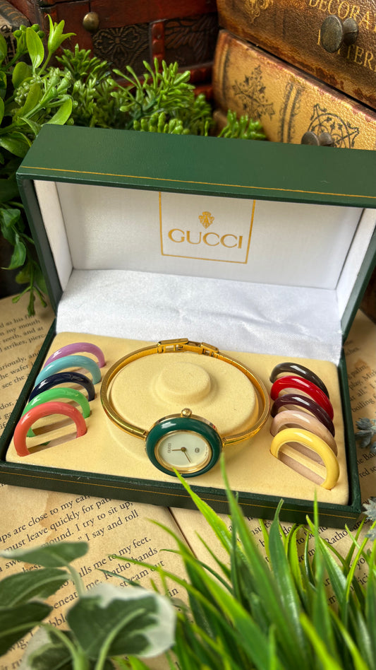 Extremely Rare Vintage Gucci 1100L Interchangeable Bezel Set Bangle Watch in Gold Tone