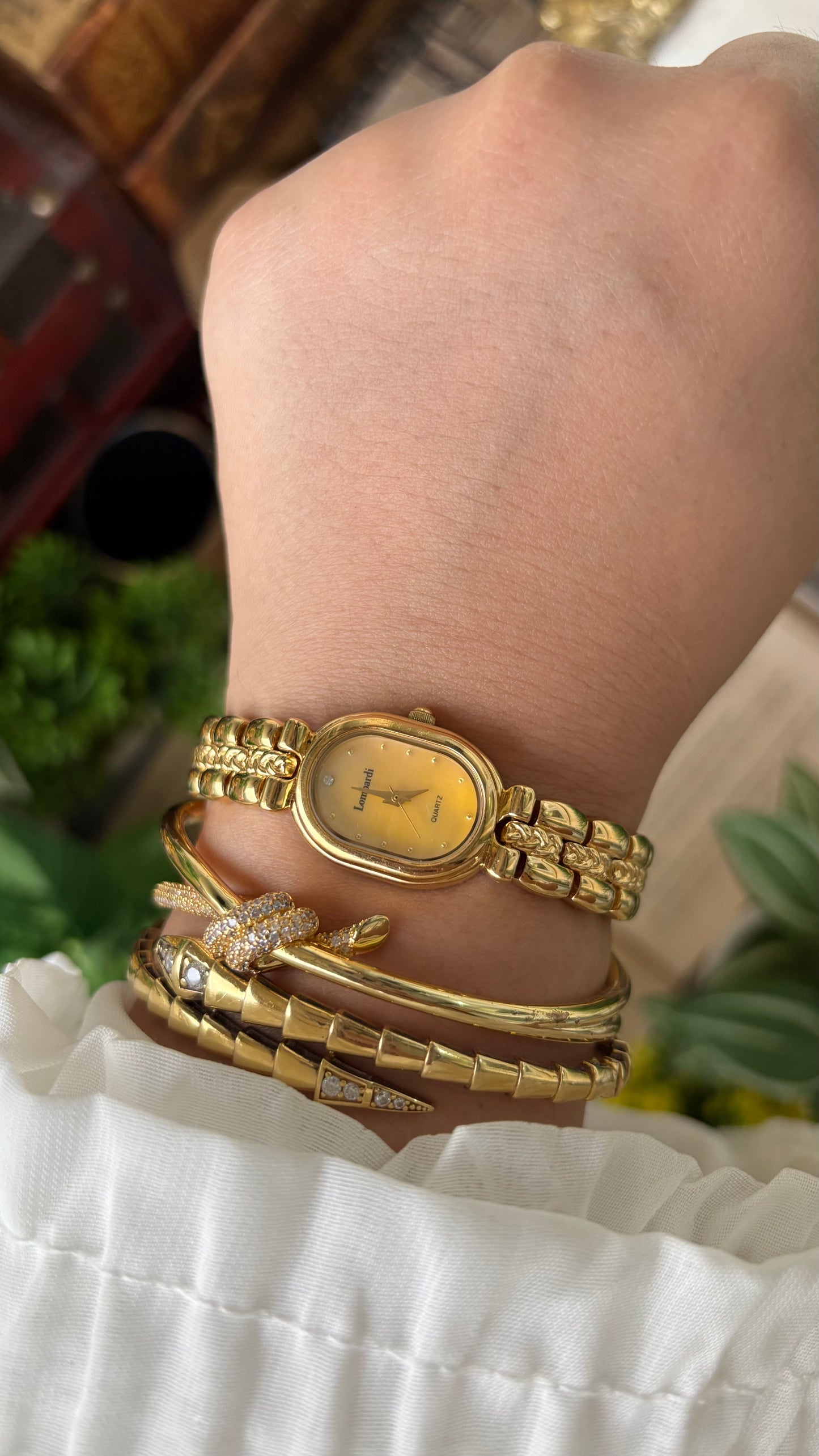 Vintage Lombardi Watch in Gold Tone Mother of Pearl Oval Dial Quartz