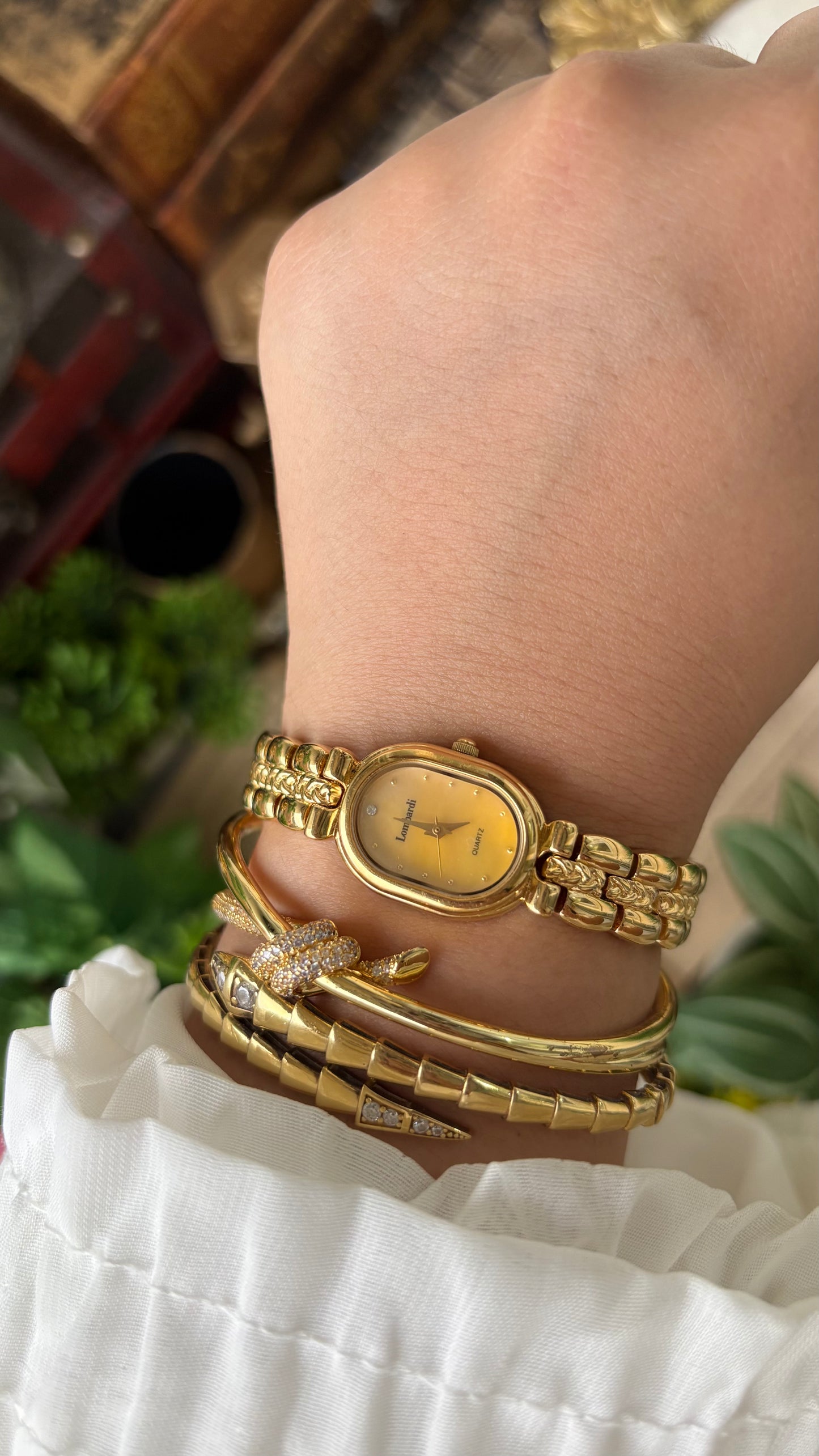 Vintage Lombardi Watch in Gold Tone Mother of Pearl Oval Dial Quartz