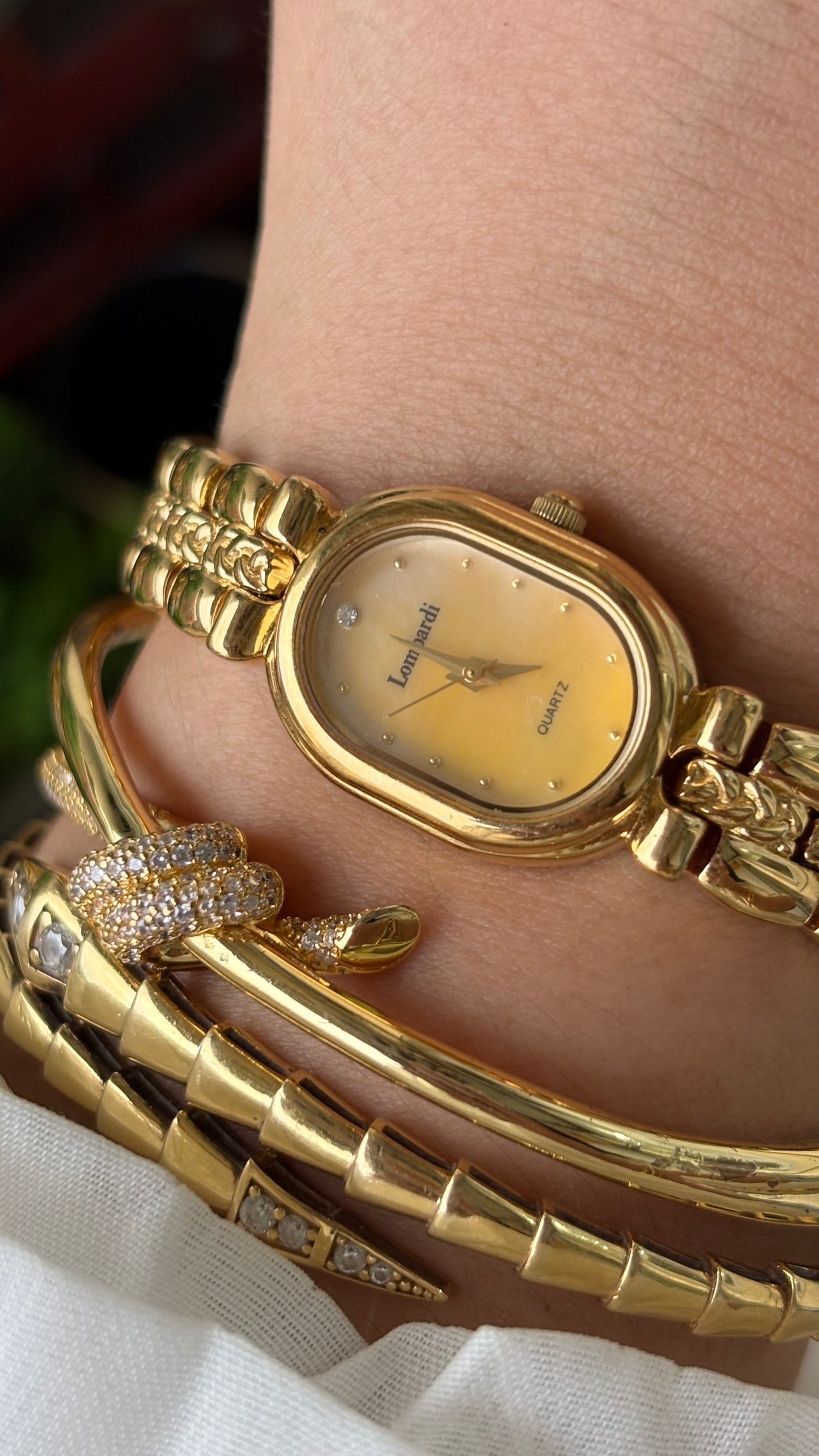 Vintage Lombardi Watch in Gold Tone Mother of Pearl Oval Dial Quartz