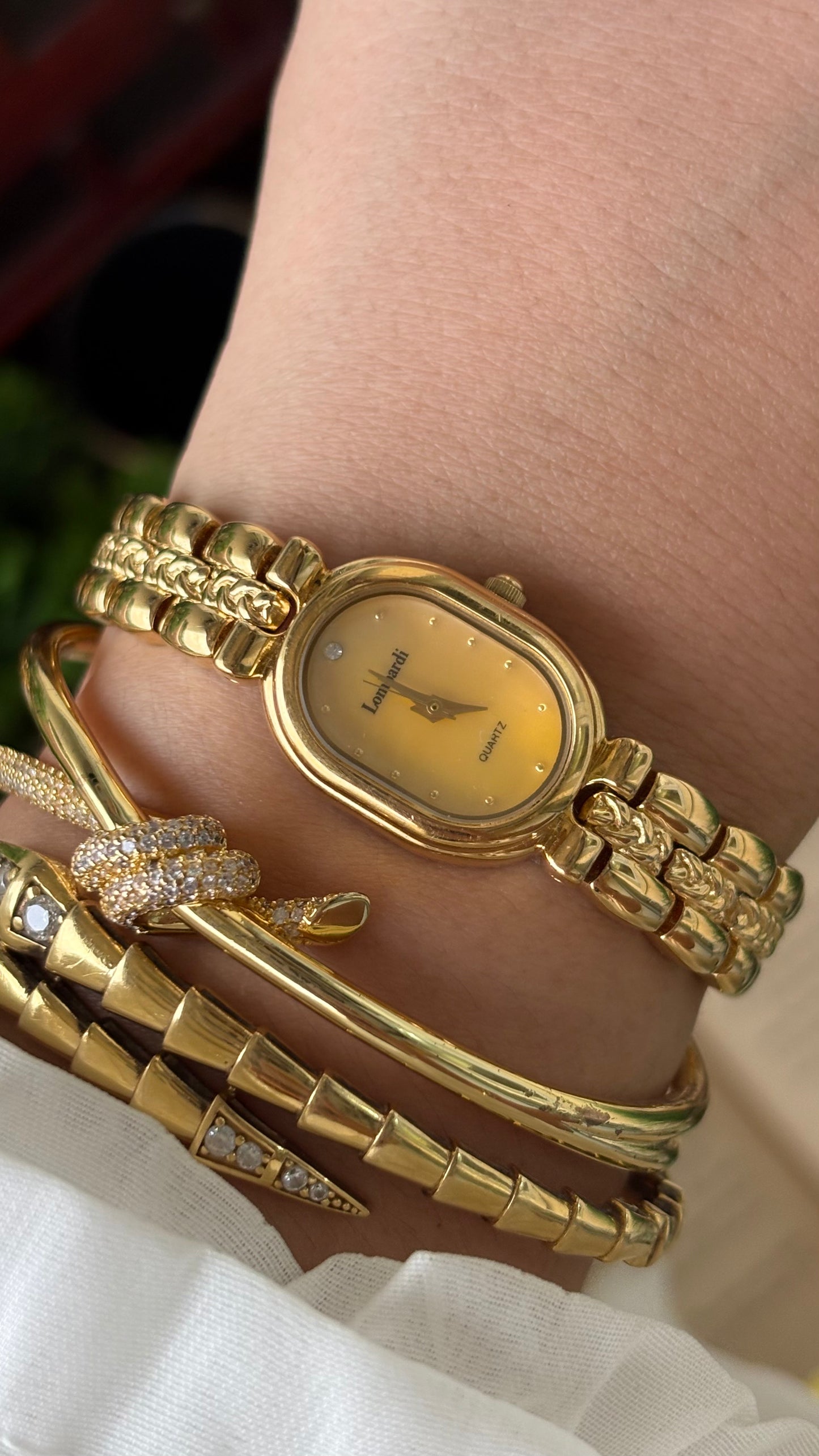 Vintage Lombardi Watch in Gold Tone Mother of Pearl Oval Dial Quartz