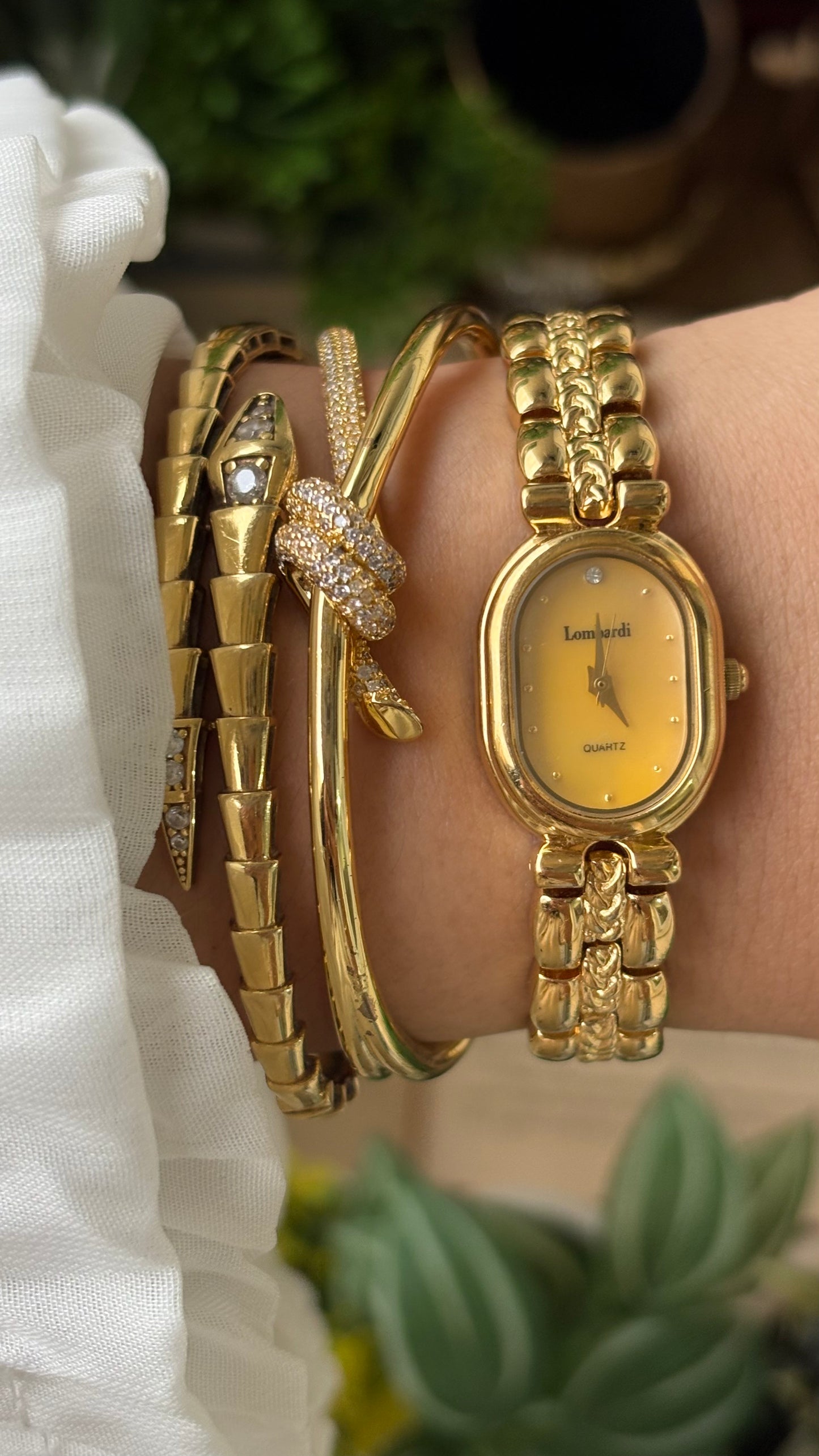 Vintage Lombardi Watch in Gold Tone Mother of Pearl Oval Dial Quartz