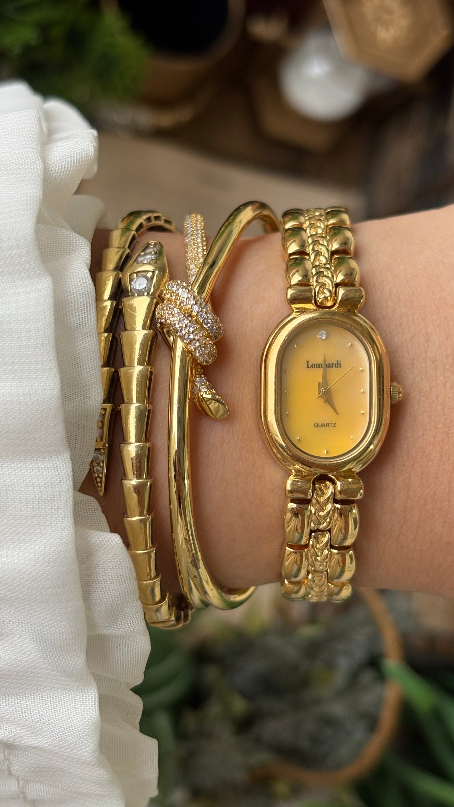 Vintage Lombardi Watch in Gold Tone Mother of Pearl Oval Dial Quartz