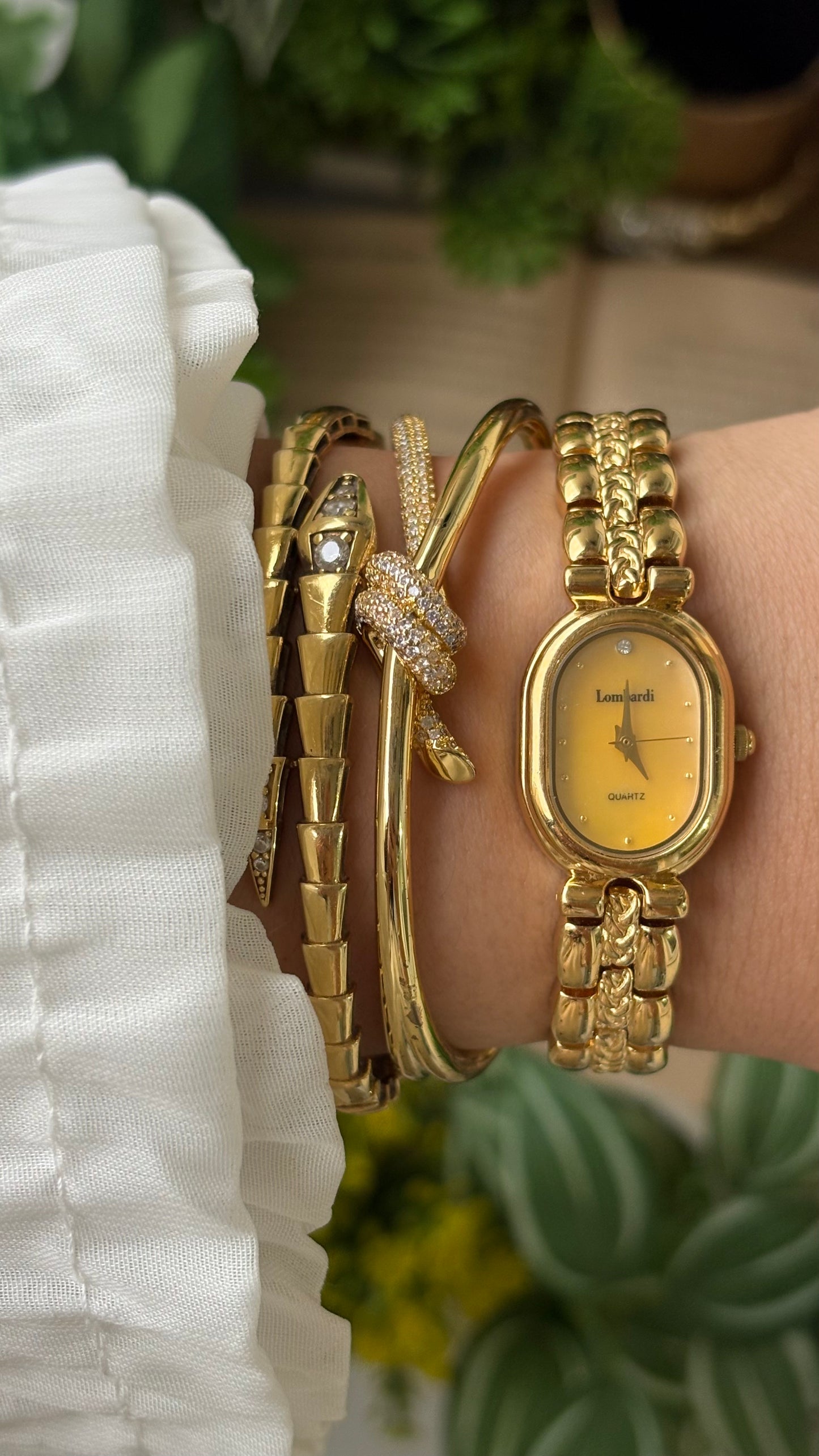 Vintage Lombardi Watch in Gold Tone Mother of Pearl Oval Dial Quartz