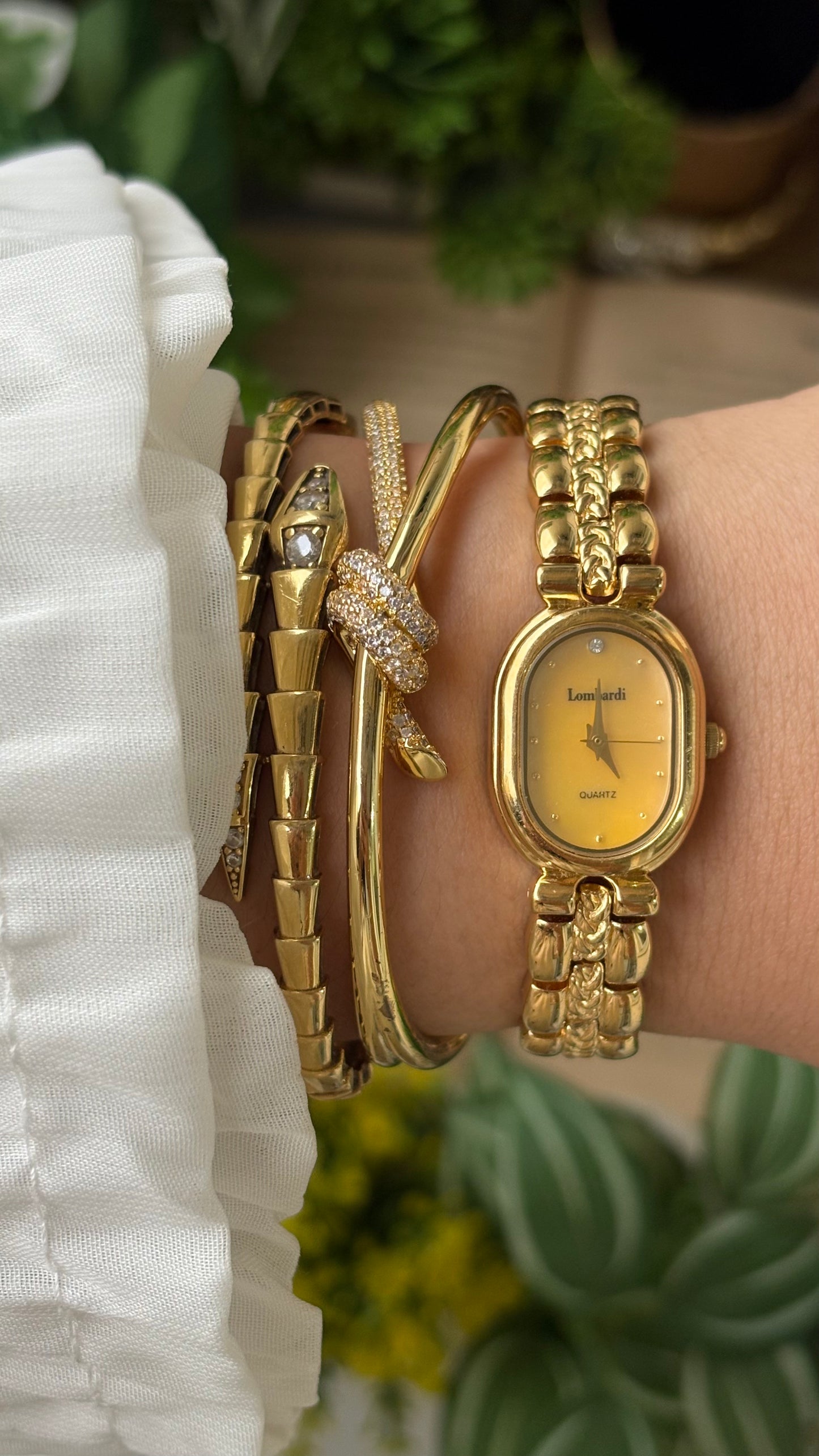 Vintage Lombardi Watch in Gold Tone Mother of Pearl Oval Dial Quartz