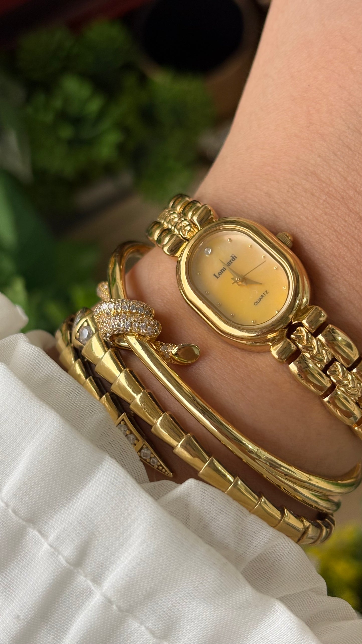 Vintage Lombardi Watch in Gold Tone Mother of Pearl Oval Dial Quartz