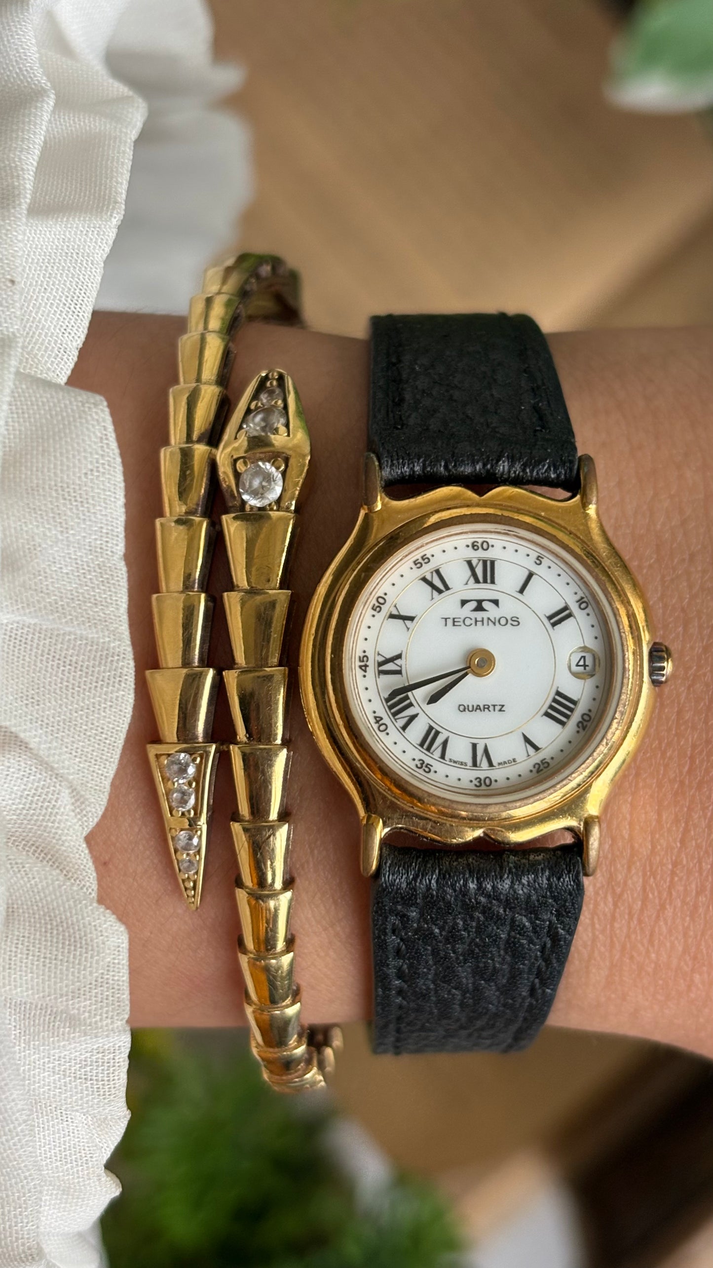 Vintage Technos Swiss Watch in Black Leather Strap Roman Dial with Window Date