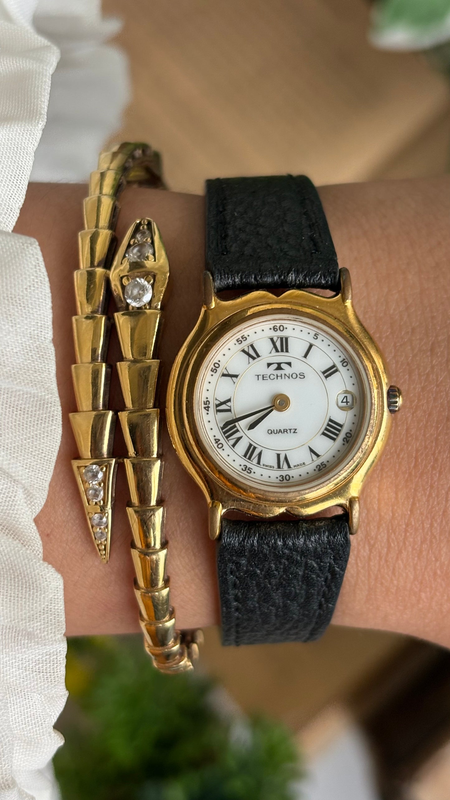 Vintage Technos Swiss Watch in Black Leather Strap Roman Dial with Window Date