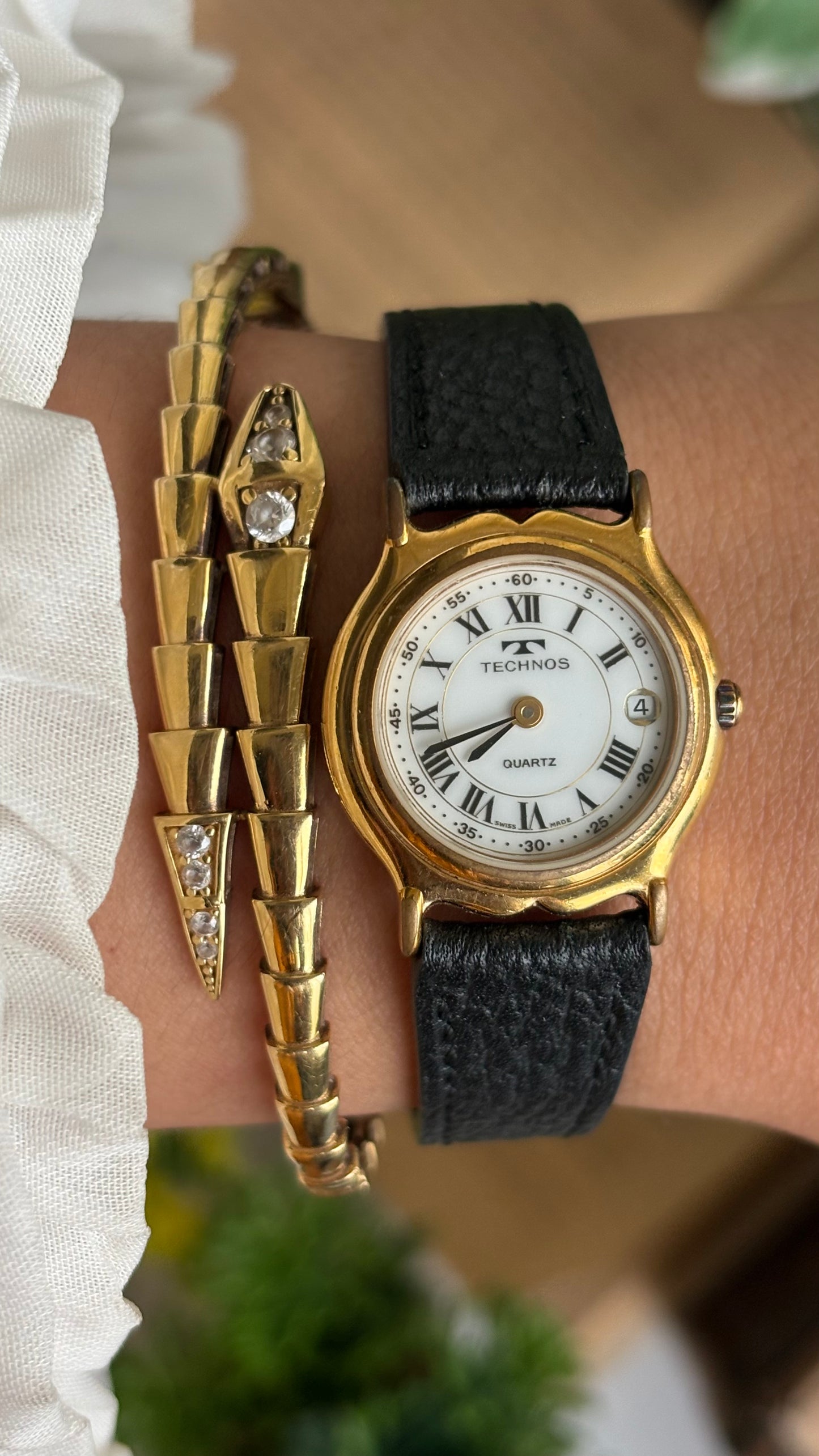 Vintage Technos Swiss Watch in Black Leather Strap Roman Dial with Window Date
