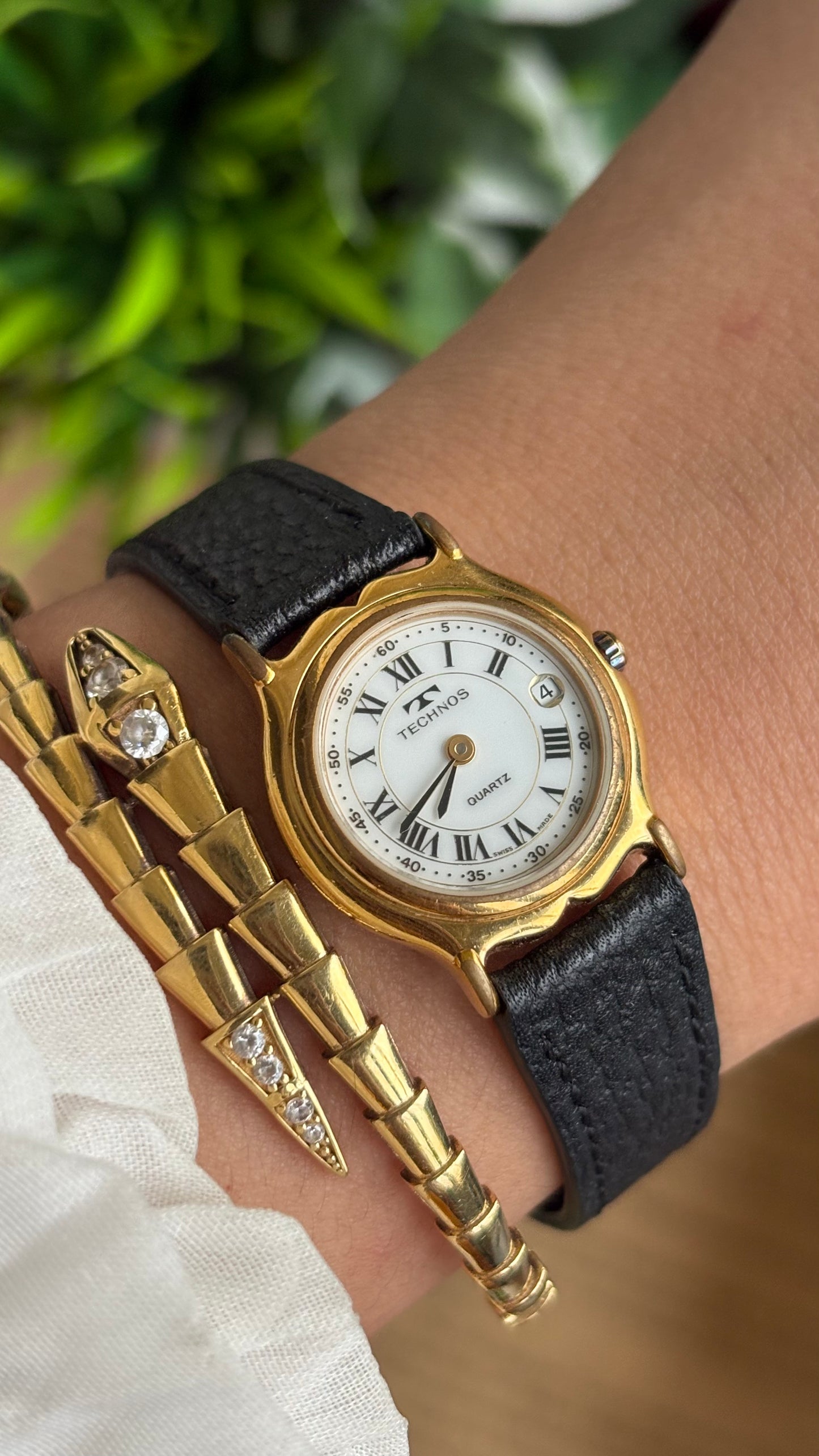 Vintage Technos Swiss Watch in Black Leather Strap Roman Dial with Window Date